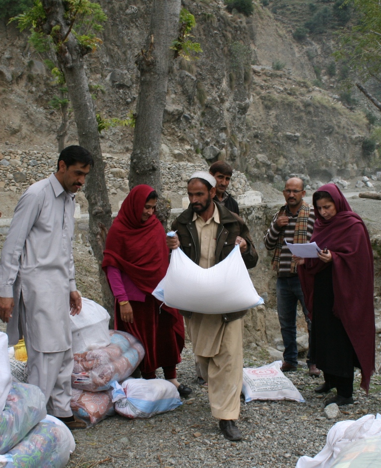 Distributing Relief In Seo, Kohistan